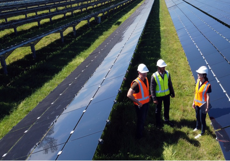 solar panels and workers
